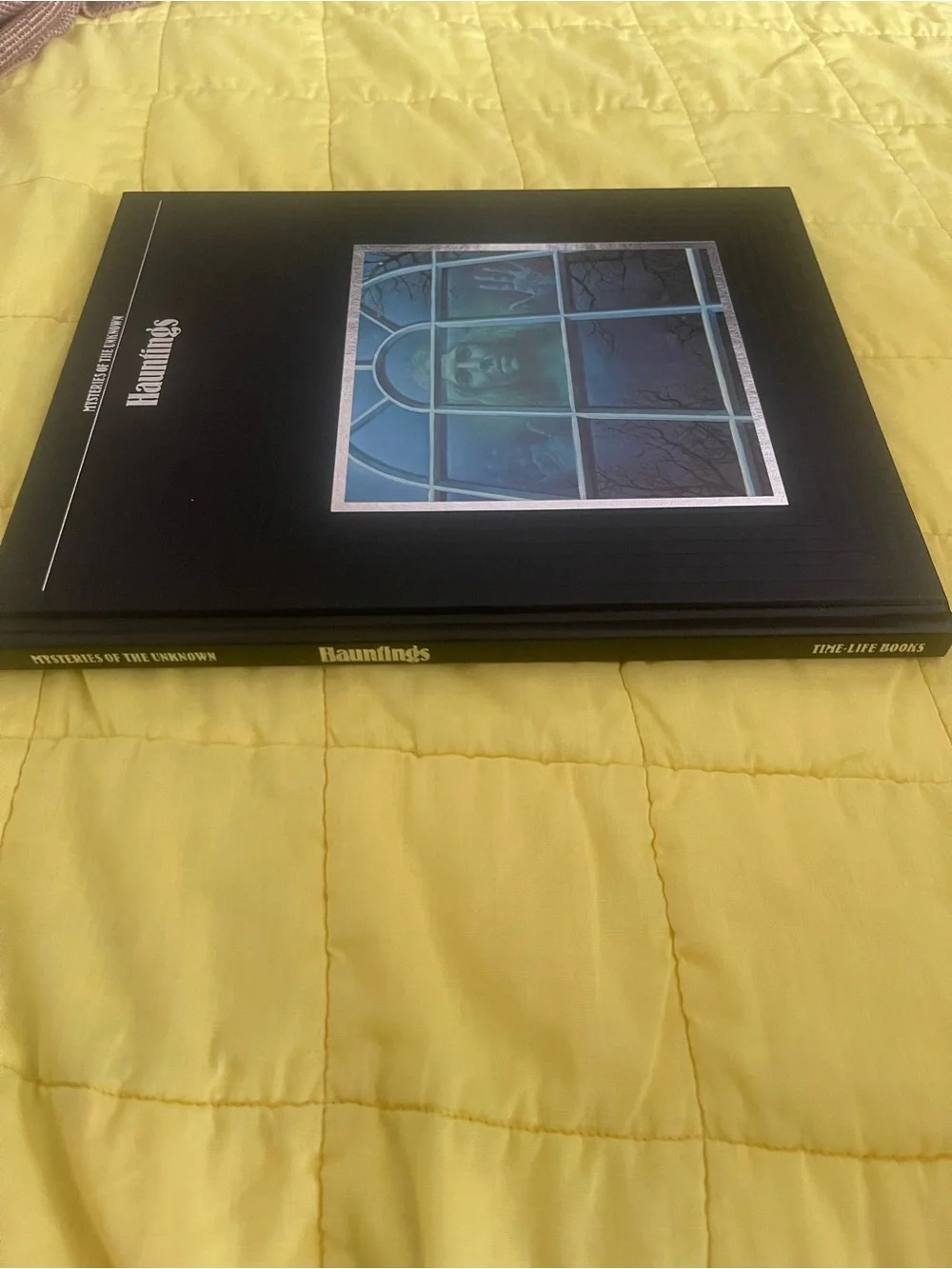Hauntings Hardcover Book - Black & Teal Cover